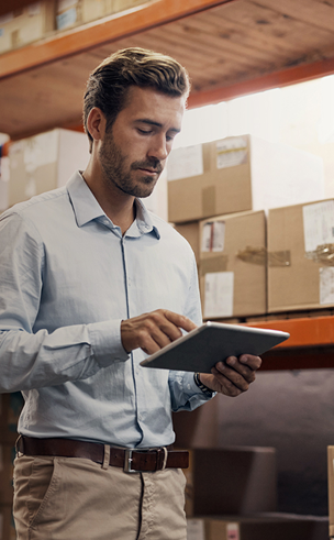 A man holding a tablet.