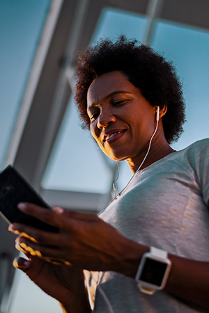 A woman holding a phone.
